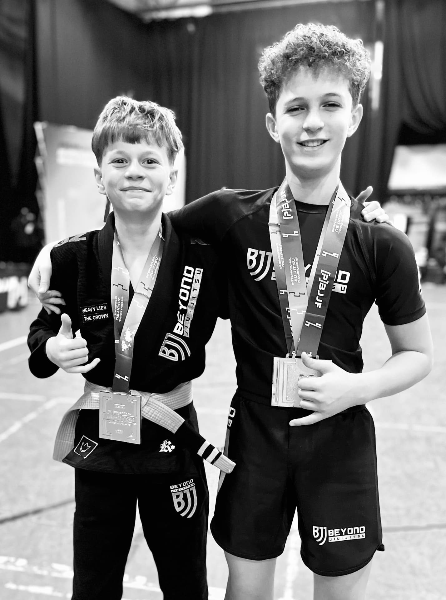 Two Beyond BJJ youth competitors with medals at PBJJF Championship